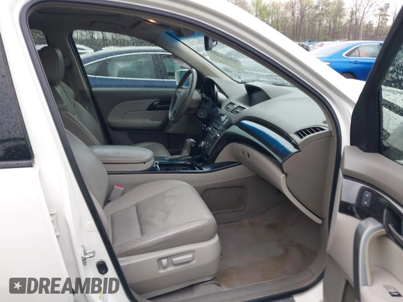 2009 Acura MDX Tech Pkg with VIN 2HNYD28689H518114, listed as a IAAI auction lot 42021557 with 303,364 mi miles. Bid and sale history available at carsss.com. Image 5.
