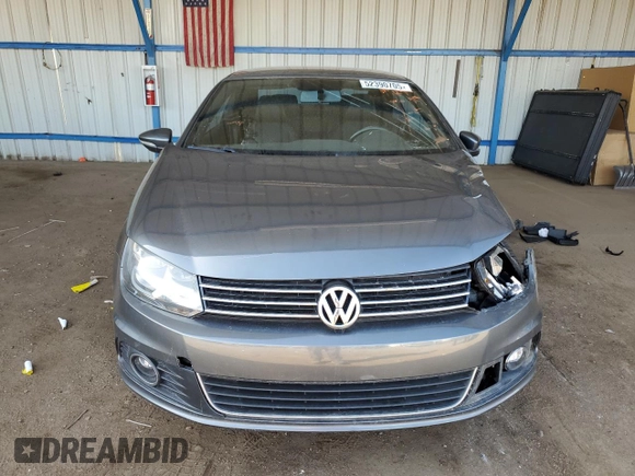 2014 Volkswagen Eos Komfort with VIN WVWBW8AH9EV006190, listed as a Copart auction lot 52390705 with 124,370 mi miles and Salvage Title. Bid and sale history available at DreamBid. Image 5.