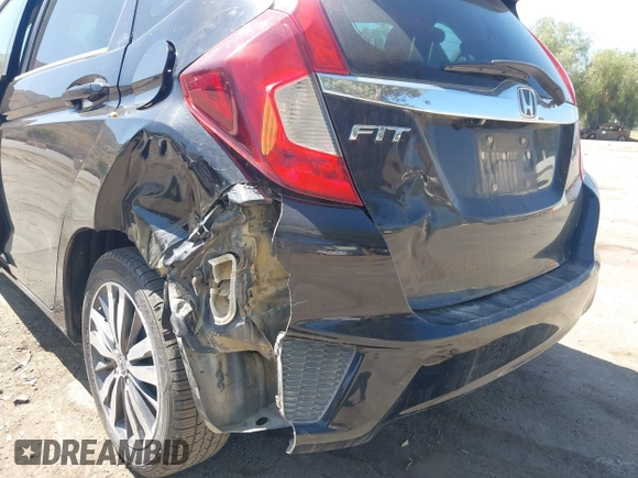 2015 Honda Fit EX-L z VIN 3HGGK5H88FM706513, wystawiony jako IAAI lot #42493772 z przebiegiem 173 129 mil mil oraz . Historia ofert i sprzedaży dostępna na DreamBid. Obrazek 6.