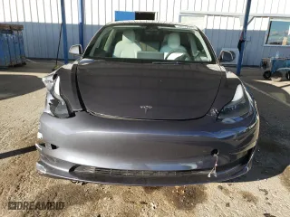 2023 Tesla Model 3 with VIN 5YJ3E1EA2PF438259, listed as a Copart auction lot 44572595 with 28,194 mi miles and Salvage Title. Bid and sale history available at carsss.com. Image 5.