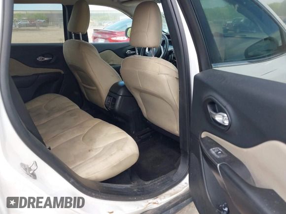 2015 Jeep Cherokee Latitude z VIN 1C4PJMCS3FW557734, wystawiony jako IAAI lot #42273937 z przebiegiem 168 828 mil mil oraz . Historia ofert i sprzedaży dostępna na DreamBid. Obrazek 8.