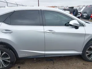 2016 Lexus RX 450h with VIN 2T2BGMCA6GC002928, listed as a IAAI auction lot 41566359 with 98,437 mi miles and . Bid and sale history available at DreamBid. Image 13.