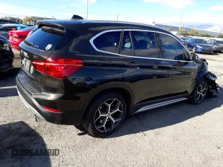 2018 BMW X1 xDrive28i with VIN WBXHT3C34J5K28026, listed as a Copart auction lot 73421382 with 54,327 mi miles. Bid and sale history available at carsss.com. Image 3.