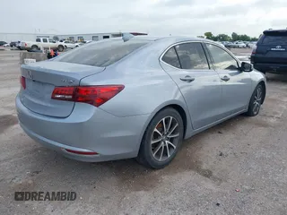 2015 Acura TLX V6 with VIN 19UUB2F32FA021137, listed as a IAAI auction lot 42733315 with 113,486 mi miles and . Bid and sale history available at DreamBid. Image 4.