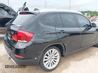 2015 BMW X1 sDrive28i z VIN WBAVM1C58FV314530, wystawiony jako IAAI lot #42184209 z przebiegiem 148 619 mil mil oraz . Historia ofert i sprzedaży dostępna na DreamBid. Obrazek 6.