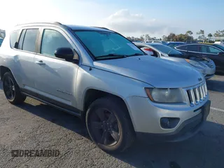 2014 Jeep Compass Sport with VIN 1C4NJDBB4ED567515, listed as a IAAI auction lot 42138801 with 183,673 mi miles. Bid and sale history available at carsss.com. Image 1.