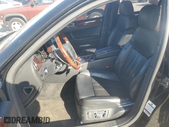 2006 Bentley Flying Spur z VIN SCBBR53W46C039793, wystawiony jako Copart lot #50169415 z przebiegiem 80 415 mil mil oraz Szkody całkowita. Historia ofert i sprzedaży dostępna na DreamBid. Obrazek 7.