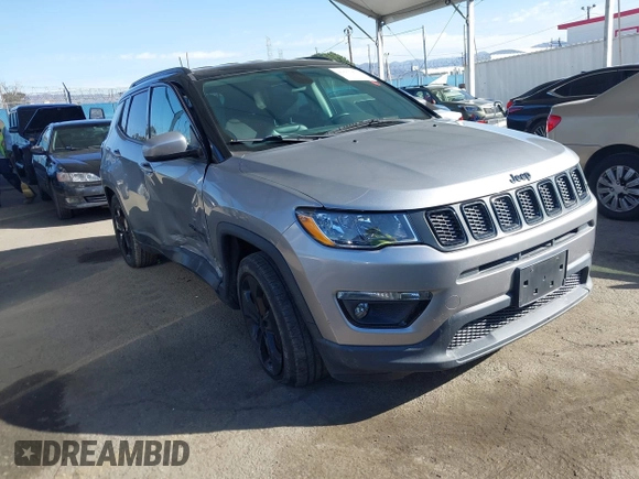 2020 Jeep Compass Latitude w/Sun/Safety Pkg with VIN 3C4NJCBB1LT102627, listed as a IAAI auction lot 41657827 with 68,371 mi miles. Bid and sale history available at carsss.com. Image 1.