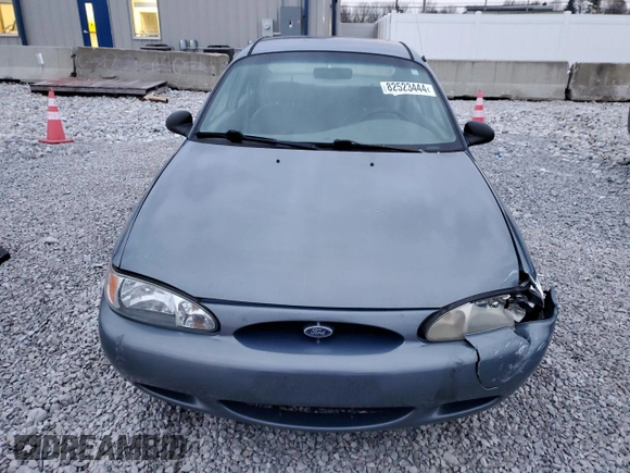 1999 Ford Escort LX z VIN 1FAFP10P6XW211371, wystawiony jako Copart lot #82523444 z przebiegiem 122 534 mil mil oraz Szkody całkowita. Historia ofert i sprzedaży dostępna na DreamBid. Obrazek 5.