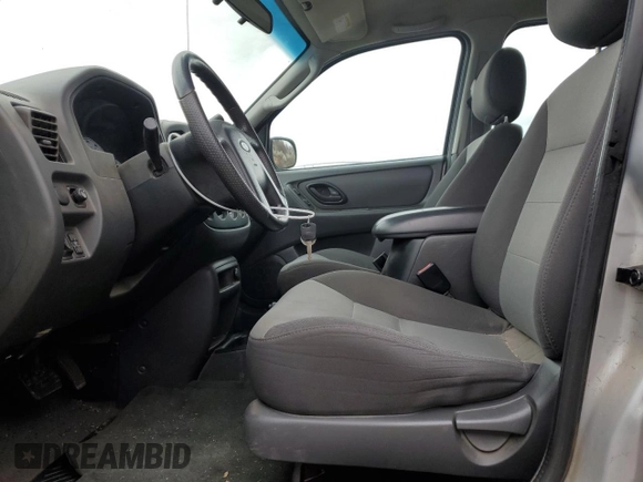2004 Ford Escape XLS with VIN 1FMYU92194KA15099, listed as a Copart auction lot 47258535 with 147,409 mi miles and Clean Title. Bid and sale history available at DreamBid. Image 7.