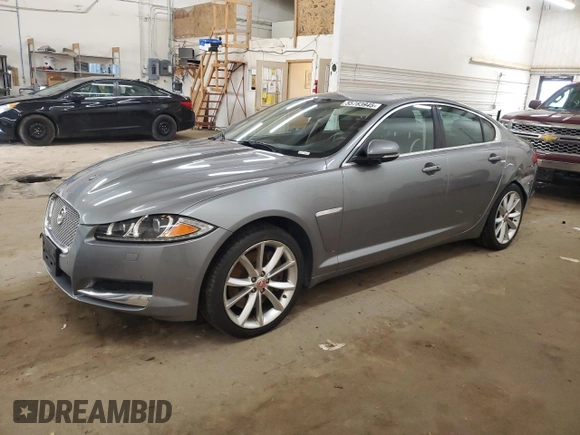 2015 Jaguar XF Portfolio with VIN SAJWJ0FF8F8U65883, listed as a Copart auction lot 55783945 with 133,431 mi miles and Salvage Title. Bid and sale history available at DreamBid. Image 1.
