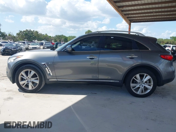 2016 Infiniti QX70 with VIN JN8CS1MU9GM671314, listed as a IAAI auction lot 42015268 with 122,850 mi miles and . Bid and sale history available at DreamBid. Image 14.