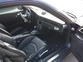 2006 Porsche 911 Carrera S with VIN WP0AB29986S740565, listed as a IAAI auction lot 41488077 with 81,471 mi miles. Bid and sale history available at carsss.com. Image 5.