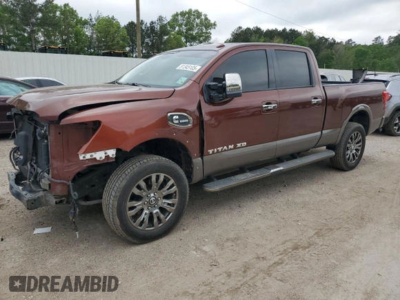 2016 Nissan Titan Platinum Reserve z VIN 1N6BA1F27GN502924, wystawiony jako Copart lot #51345105 z przebiegiem 90 215 mil mil oraz Szkoda całkowita • Salvage title. Historia ofert i sprzedaży dostępna na DreamBid. Obrazek 1.
