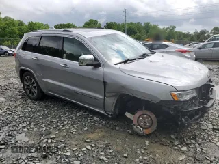 2018 Jeep Grand Cherokee Overland z VIN 1C4RJFCTXJC108624, wystawiony jako Copart lot #53738094 z przebiegiem 83 040 mil mil oraz . Historia ofert i sprzedaży dostępna na DreamBid. Obrazek 4.