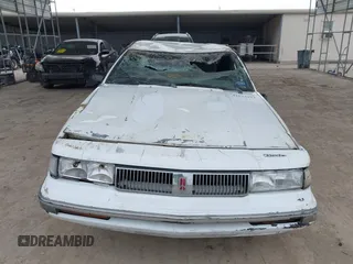 1995 Oldsmobile Cutlass Ciera with VIN 1G3AJ5549S6383205, listed as a IAAI auction lot 41631914 with 76,328 mi miles and . Bid and sale history available at DreamBid. Image 12.