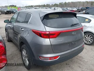 2017 Kia Sportage LX with VIN KNDPMCAC2H7236875, listed as a IAAI auction lot 41704229 with 183,094 mi miles and . Bid and sale history available at carsss.com. Image 3.