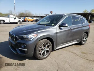 2018 BMW X1 xDrive28i with VIN WBXHT3C33J5K31838, listed as a Copart auction lot 48650943 with 63,064 mi miles. Bid and sale history available at carsss.com. Image 1.