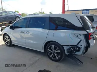 2021 Honda Odyssey Touring z VIN 5FNRL6H80MB003323, wystawiony jako IAAI lot #42303968 z przebiegiem 51 531 mil mil oraz . Historia ofert i sprzedaży dostępna na DreamBid. Obrazek 15.