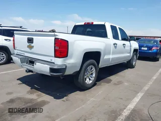 2014 Chevrolet Silverado 1500 LT with VIN 1GCRCREH0EZ355674, listed as a IAAI auction lot 42180931 with 195,496 mi miles and . Bid and sale history available at DreamBid. Image 4.