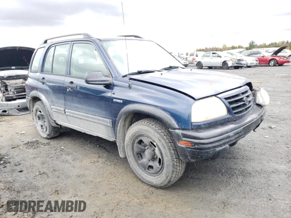 2004 Suzuki Vitara z VIN 2S3TD62VX46100019, wystawiony jako Copart lot #74291684 z przebiegiem 148 566 mil mil oraz Szkoda całkowita • Salvage title. Historia ofert i sprzedaży dostępna na DreamBid. Obrazek 4.