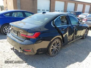 2021 BMW 3 Series 330i с VIN 3MW5R1J0XM8B69340, выставлен на аукционе IAAI как лот 41864211 с пробегом 63 614 миль миль и . История ставок и продаж доступна на DreamBid. Изображение 4.