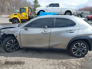 2019 Lexus UX 250h с VIN JTHU9JBH0K2002546, выставлен на аукционе IAAI как лот 41968823 с пробегом 77 014 миль миль и . История ставок и продаж доступна на DreamBid. Изображение 13.