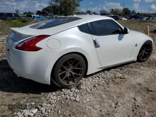 2014 Nissan 370Z Touring with VIN JN1AZ4EH0EM636520, listed as a Copart auction lot 73661434 with 0 mi miles and Salvage Title. Bid and sale history available at carsss.com. Image 3.