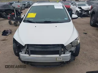 2014 Chevrolet Sonic LT with VIN 1G1JC6SB2E4215465, listed as a IAAI auction lot 41140292 with 93,224 mi miles. Bid and sale history available at carsss.com. Image 12.