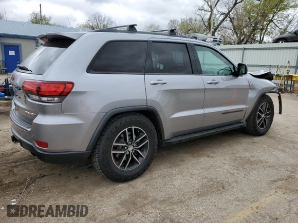 2018 Jeep Grand Cherokee Trailhawk with VIN 1C4RJFLG8JC164774, listed as a Copart auction lot 51699845 with 104,467 mi miles and Salvage title. Bid and sale history available at DreamBid. Image 3.