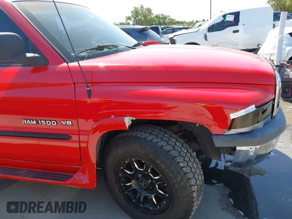 1999 Dodge 1500 z VIN 1B7HC13Z3XJ522717, wystawiony jako IAAI lot #41990467 z przebiegiem 146 472 mil mil oraz . Historia ofert i sprzedaży dostępna na DreamBid. Obrazek 12.