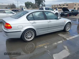 2005 BMW 3 Series 325i with VIN WBAAZ33485KP91350, listed as a IAAI auction lot 41536220 with 153,894 mi miles and . Bid and sale history available at DreamBid. Image 4.