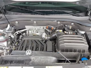 2023 Volkswagen Atlas SE z VIN 1V2HE2CA0PC222291, wystawiony jako IAAI lot #42431536 z przebiegiem 23 114 mil mil oraz . Historia ofert i sprzedaży dostępna na DreamBid. Obrazek 10.