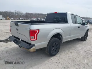 2015 Ford F-150 XLT with VIN 1FTEX1E82FFC23636, listed as a IAAI auction lot 41835465 with 149,801 mi miles. Bid and sale history available at carsss.com. Image 4.
