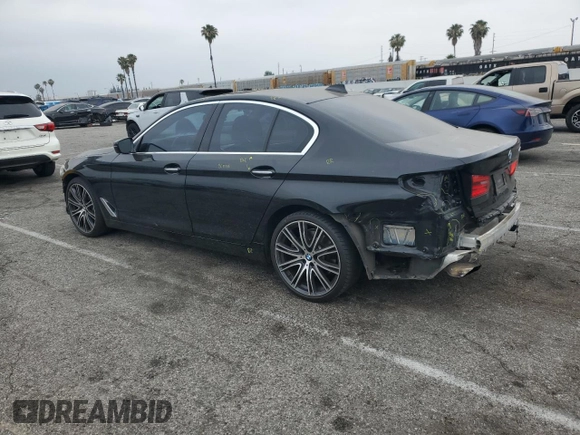 2017 BMW 5 Series 540i with VIN WBAJE5C33HG915675, listed as a Copart auction lot 55857135 with 57,330 mi miles and Salvage title. Bid and sale history available at DreamBid. Image 2.