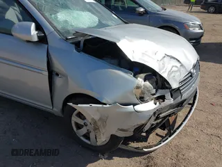 2009 Hyundai Accent Auto GLS z VIN KMHCN46C69U326197, wystawiony jako IAAI lot #42268198 z przebiegiem 74 308 mil mil oraz . Historia ofert i sprzedaży dostępna na DreamBid. Obrazek 17.