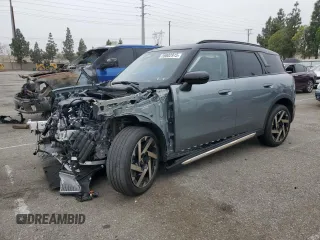 2025 MINI Countryman S with VIN WMZ23GA0XS7R15827, listed as a Copart auction lot 59802915 with 7,742 mi miles and Salvage title. Bid and sale history available at DreamBid. Image 1.
