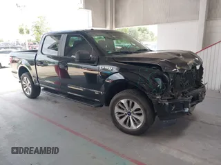 2018 Ford F-150 XL with VIN 1FTEW1EP5JKE64097, listed as a IAAI auction lot 42656327 with 150,641 mi miles and . Bid and sale history available at DreamBid. Image 1.