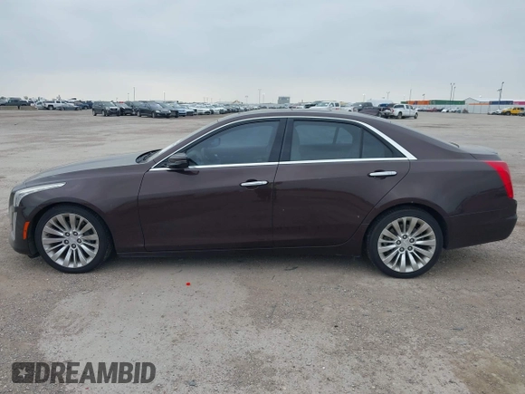 2016 Cadillac CTS Luxury Collection RWD z VIN 1G6AR5SX7G0111806, wystawiony jako IAAI lot #41908192 z przebiegiem 86 309 mil mil oraz . Historia ofert i sprzedaży dostępna na DreamBid. Obrazek 14.