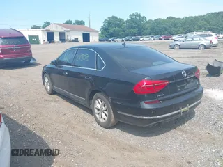 2016 Volkswagen Passat S with VIN 1VWAT7A30GC058676, listed as a IAAI auction lot 39978574 with Not provided miles and . Bid and sale history available at DreamBid. Image 3.