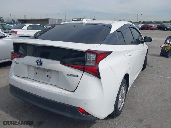 2019 Toyota Prius L Eco with VIN JTDKARFU2K3075613, listed as a IAAI auction lot 41691401 with 83,053 mi miles. Bid and sale history available at carsss.com. Image 4.