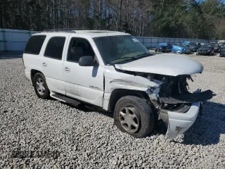2006 GMC Yukon Denali z VIN 1GKEK63UX6J136371, wystawiony jako Copart lot #50168595 z przebiegiem Nie podano mil oraz Szkody całkowita. Historia ofert i sprzedaży dostępna na DreamBid. Obrazek 4.