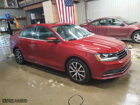 2017 Volkswagen Jetta 1.4T SE with VIN 3VWB67AJXHM314865, listed as a Copart auction lot 87889515 with 120,500 mi miles and Salvage Title. Bid and sale history available at carsss.com. Image 4.