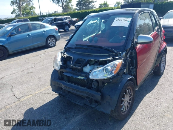 2013 Smart fortwo Pure z VIN WMEEJ3BAXDK632221, wystawiony jako IAAI lot #42243706 z przebiegiem 75 815 mil mil oraz . Historia ofert i sprzedaży dostępna na DreamBid. Obrazek 6.