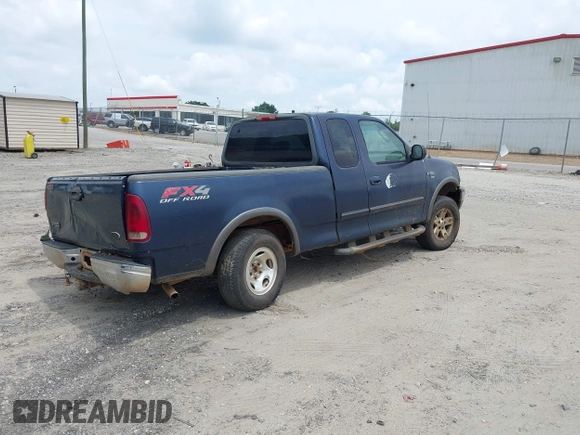 2003 Ford F-150 XL with VIN 1FTRX18W63NA57957, listed as a IAAI auction lot 42514779 with 406,771 mi miles and . Bid and sale history available at DreamBid. Image 4.