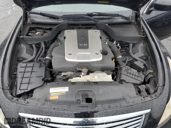 2012 Infiniti G25 x z VIN JN1DV6AR6CM860763, wystawiony jako Copart lot #60118655 z przebiegiem 182 446 mil mil oraz Szkoda całkowita • Salvage title. Historia ofert i sprzedaży dostępna na DreamBid. Obrazek 11.