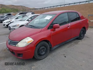 2009 Nissan Versa 1.8 S with VIN 3N1BC11E19L474039, listed as a IAAI auction lot 42045662 with 178,828 mi miles. Bid and sale history available at carsss.com. Image 2.