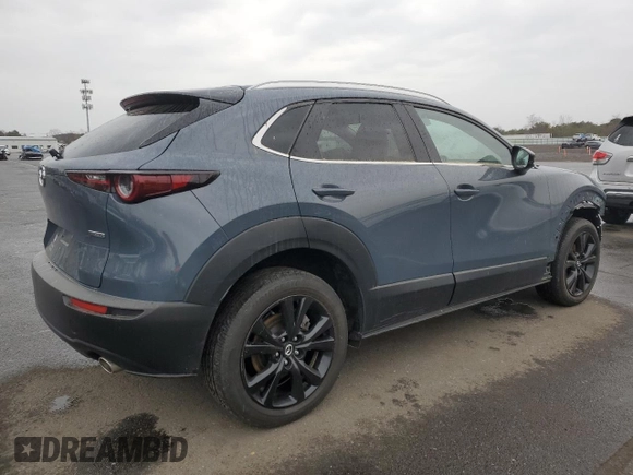 2023 Mazda CX-30 S Carbon Edition with VIN 3MVDMBCM5PM556195, listed as a Copart auction lot 47013945 with 15,223 mi miles and Salvage Title. Bid and sale history available at DreamBid. Image 3.