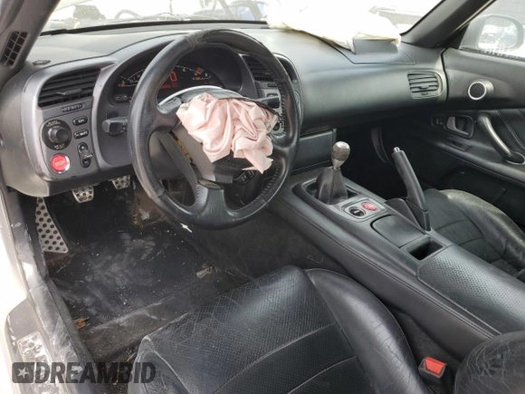 2002 Honda S2000 z VIN JHMAP11472T005753, wystawiony jako Copart lot #54002225 z przebiegiem 156 893 mil mil oraz Czysty tytuł • Clean title. Historia ofert i sprzedaży dostępna na DreamBid. Obrazek 8.