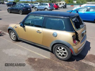 2004 MINI Hardtop with VIN WMWRC33474TC48930, listed as a IAAI auction lot 41657936 with 147,422 mi miles and . Bid and sale history available at DreamBid. Image 3.